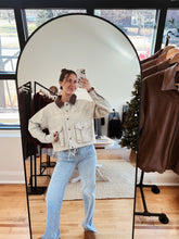 Load image into Gallery viewer, Model taking a mirror selfie wearing the essential chore jacket. 