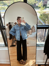 Load image into Gallery viewer, mirror selfie of model wearing the talk of the town jacket.