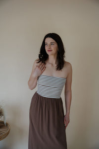 close up of model wearing the feels like home maxi dress.