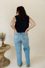 Load image into Gallery viewer, back view of model wearing the in season sweater tank. model has the sweater paired with a pair of medium wash denim.
