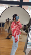 Load image into Gallery viewer, Model taking a mirror selfie wearing the sweetest devotion cardigan.