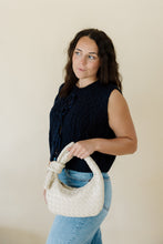 Load image into Gallery viewer, side view of model wearing the in season sweater tank. model has the sweater paired with a pair of medium wash denim.