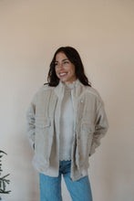 Load image into Gallery viewer, front view of model wearing the these are the days jacket. model has the jacket paired with the until you top in the color cream.