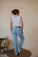 Load image into Gallery viewer, back view of model wearing the charleston denim. model has the denim paired with the forever yours top in the color white.