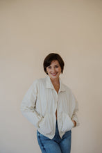 Load image into Gallery viewer, front view of model wearing the cherish the moment jacket in the color white dove. model has the jacket paired with the forever yours top in the color macchiato and the aurora denim.