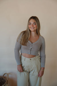 front view of model wearing the better days top. model has the top paired with the oakland chinos.