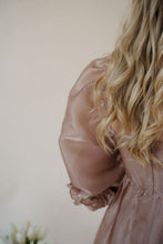 Load image into Gallery viewer, close sleeve detail view of model wearing the wherever you go dress. model has the dress paired with the dainty mallory necklace.