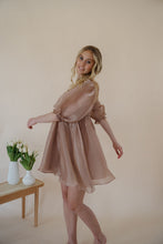 Load image into Gallery viewer, side view of model wearing the wherever you go dress. model has the dress paired with the dainty mallory necklace.
