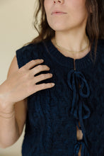 Load image into Gallery viewer, detail view of model wearing the in season sweater tank. model has the sweater paired with a pair of medium wash denim.