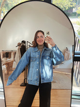 Load image into Gallery viewer, mirror selfie of model wearing the talk of the town jacket.