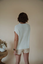 Load image into Gallery viewer, back view of model wearing the used to be set in the color cream/shell.