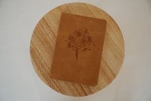 Load image into Gallery viewer, front cover view of the hosanna revival lined notebook in the Amelia theme.