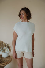 Load image into Gallery viewer, front view of model wearing the used to be set in the color cream/shell.