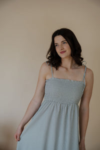 front view of model wearing the starting over dress