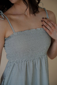 detail view of model wearing the starting over dress