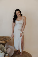 Load image into Gallery viewer, front view of model wearing the wherever I&#39;m with you maxi. model has the dress paired with the MK necklace and the magnolia earrings.