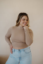 Load image into Gallery viewer, front view of model wearing the after all top in the color almond. model has the top paired with the Camden denim.