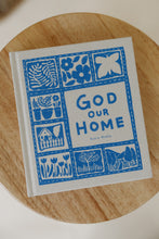 Load image into Gallery viewer, cover photo of &quot;God our Home&quot; by Katie Noble. book is shown sitting on a wooden stool.