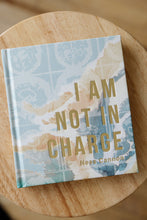 Load image into Gallery viewer, cover photo of &quot;I am not in charge&quot; by Ness Cannon. book is shown sitting on a wooden stool.