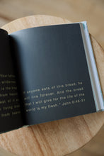 Load image into Gallery viewer, inside page photo of &quot;I am not in charge&quot; by Ness Cannon. book is shown sitting on a wooden stool.