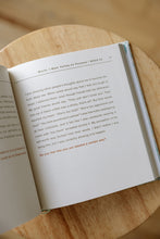 Load image into Gallery viewer, inside page photo of &quot;I am not in charge&quot; by Ness Cannon. book is shown sitting on a wooden stool.