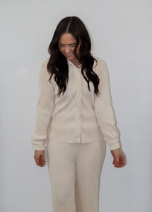 model wearing the aspen top + aspen pants in the color cream.