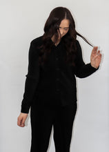 Load image into Gallery viewer, model wearing the aspen top + aspen pants in the color black.