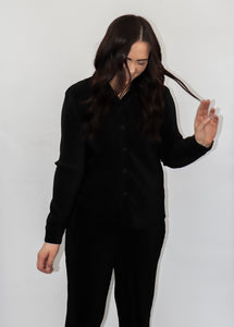 model wearing the aspen top + aspen pants in the color black.