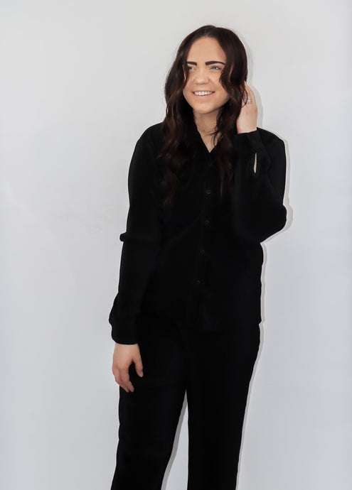 model wearing the aspen top + aspen pants in the color black.