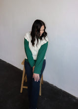 Load image into Gallery viewer, model wearing the all my days sweater vest paired with the take me away top in the color deep green. model has the tops paired with the siena denim.