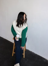 Load image into Gallery viewer, model wearing the all my days sweater vest paired with the take me away top in the color deep green. model has the tops paired with the siena denim.