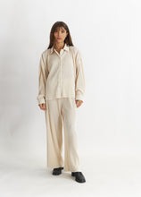 Load image into Gallery viewer, model wearing the aspen top + aspen pants in the color cream.