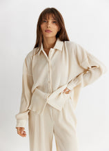 Load image into Gallery viewer, model wearing the aspen top + aspen pants in the color cream.