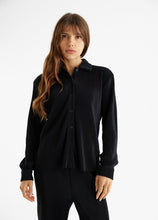 Load image into Gallery viewer, model wearing the aspen top + aspen pants in the color black.